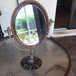 Very beautiful ornate mirror.